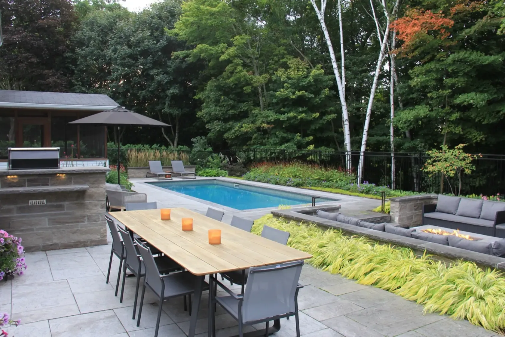 Outdoor dining area within a completed landscape