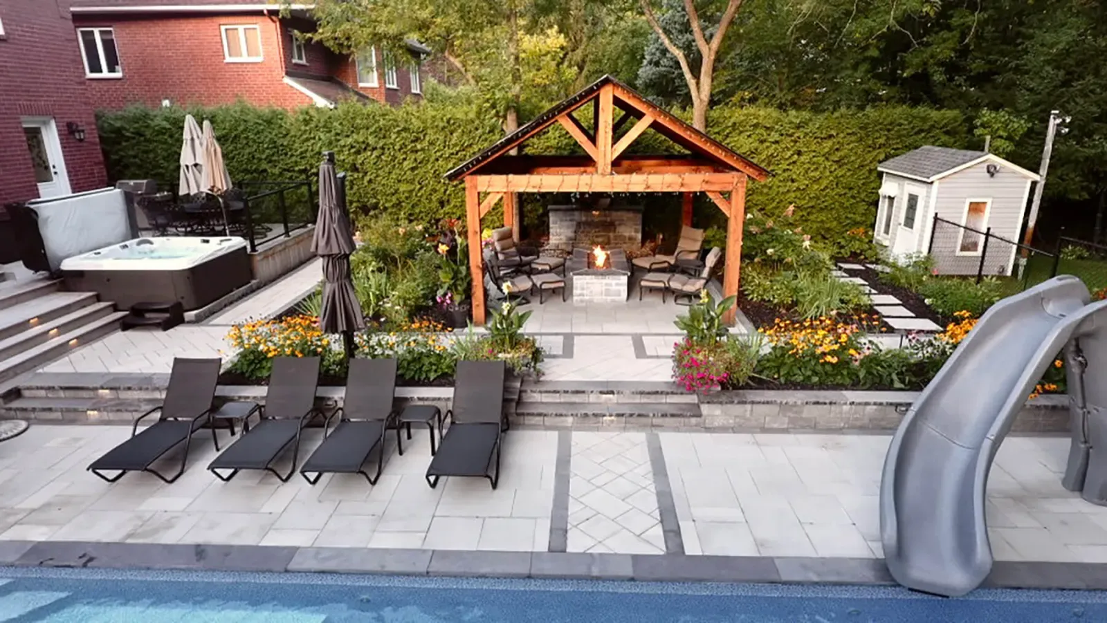 Layered garden planting beside a finished patio