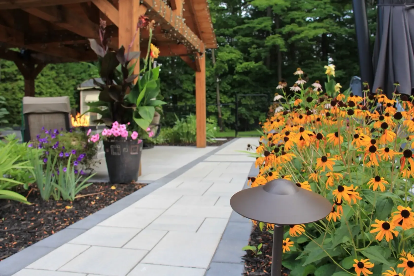 Landscape lighting across an outdoor living space